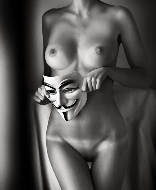 sexy nude girl with anonymous mask.