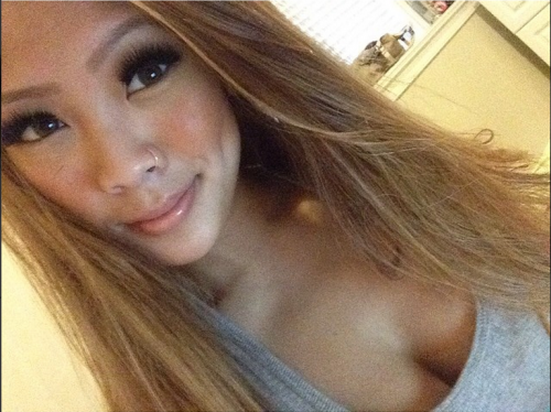 pretty asian girl with a nose ring